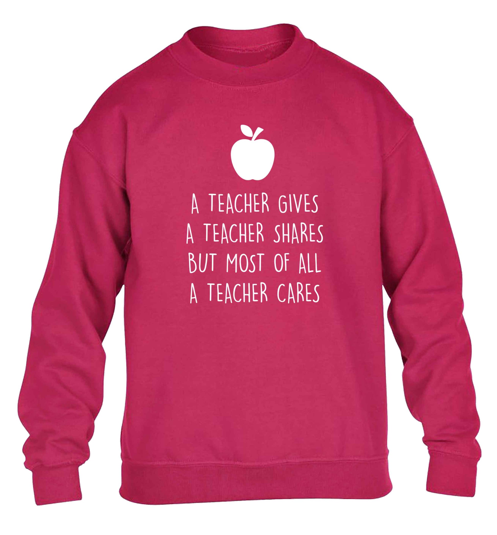 A teacher gives a teacher shares but most of all a teacher cares children's pink sweater 12-13 Years