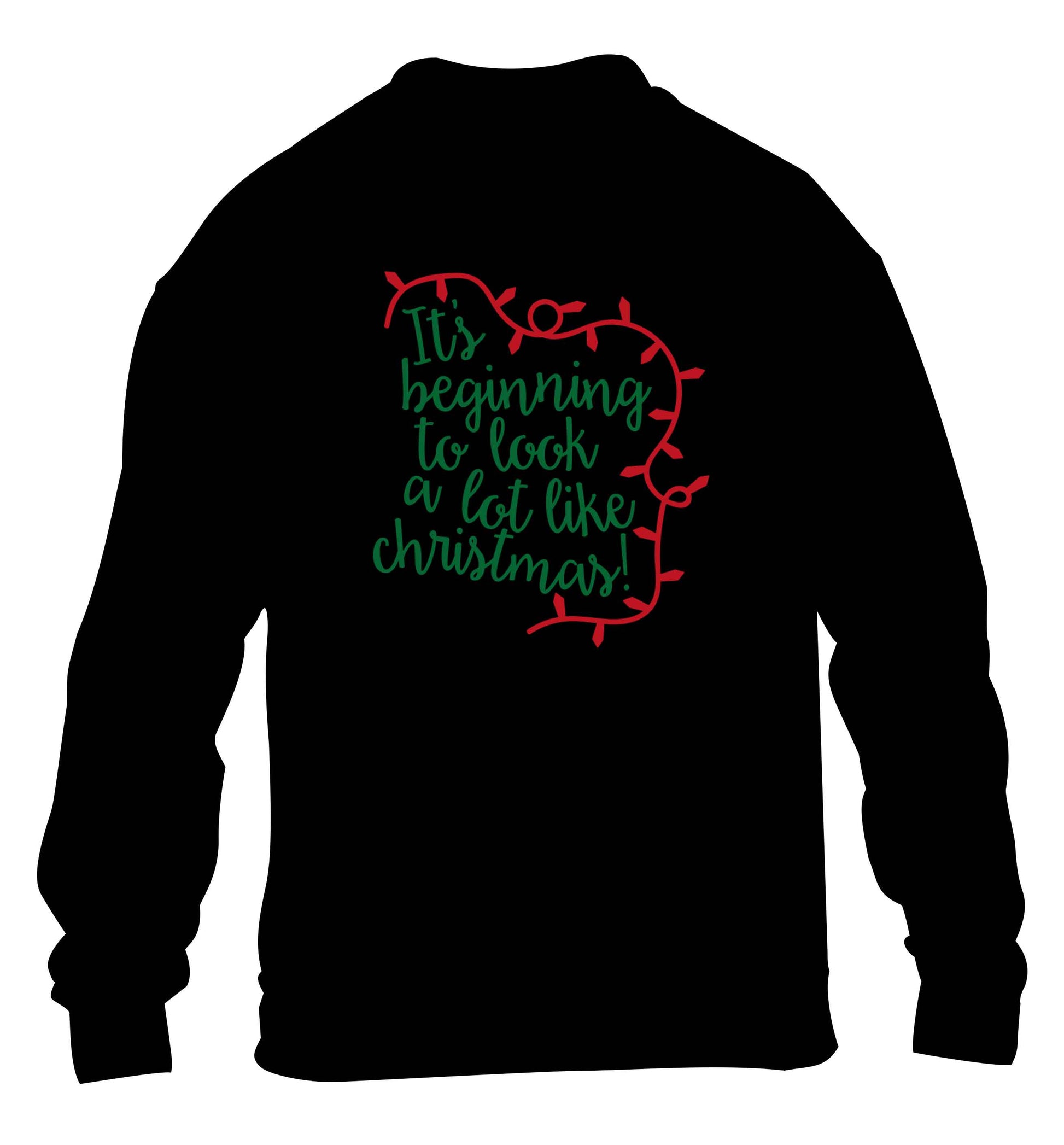 It's beginning to look a lot like Christmas children's black sweater 12-13 Years