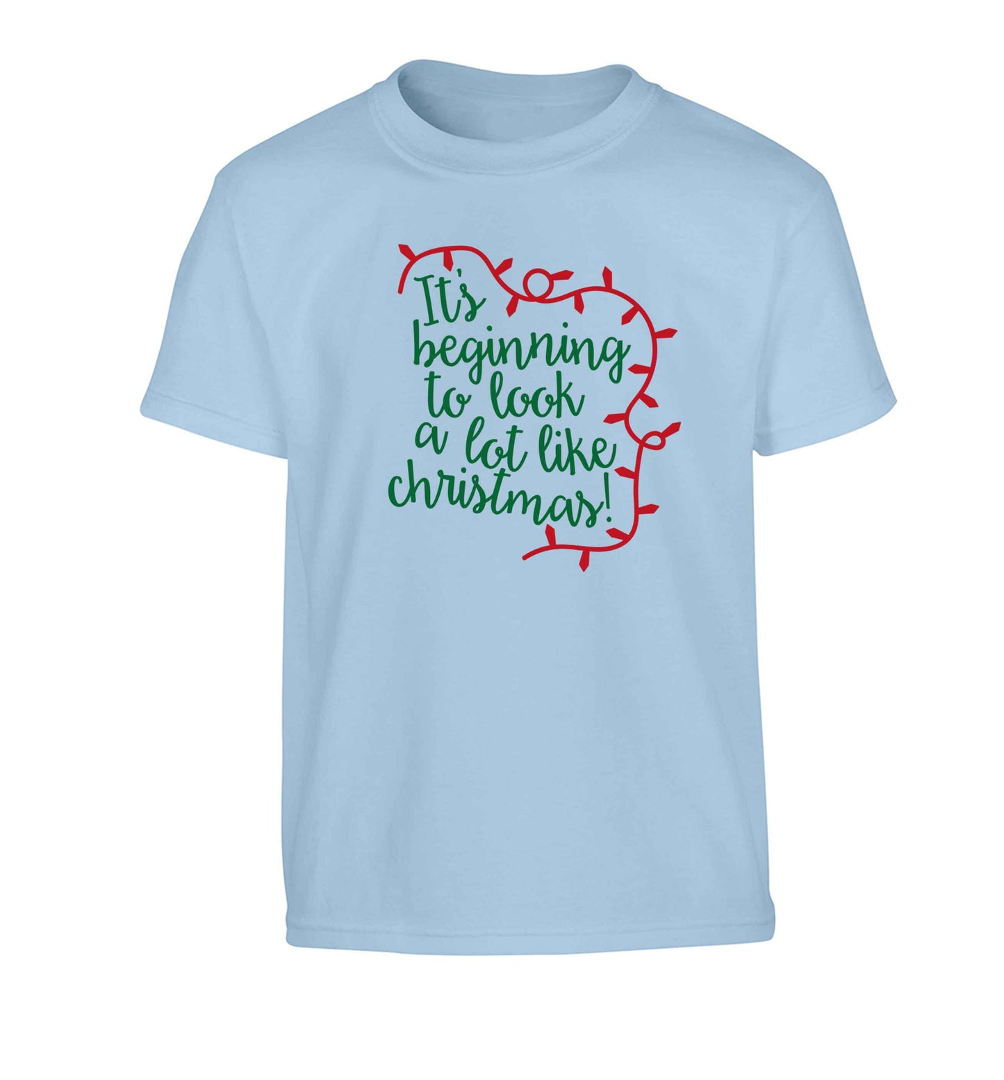 It's beginning to look a lot like Christmas Children's light blue Tshirt 12-13 Years