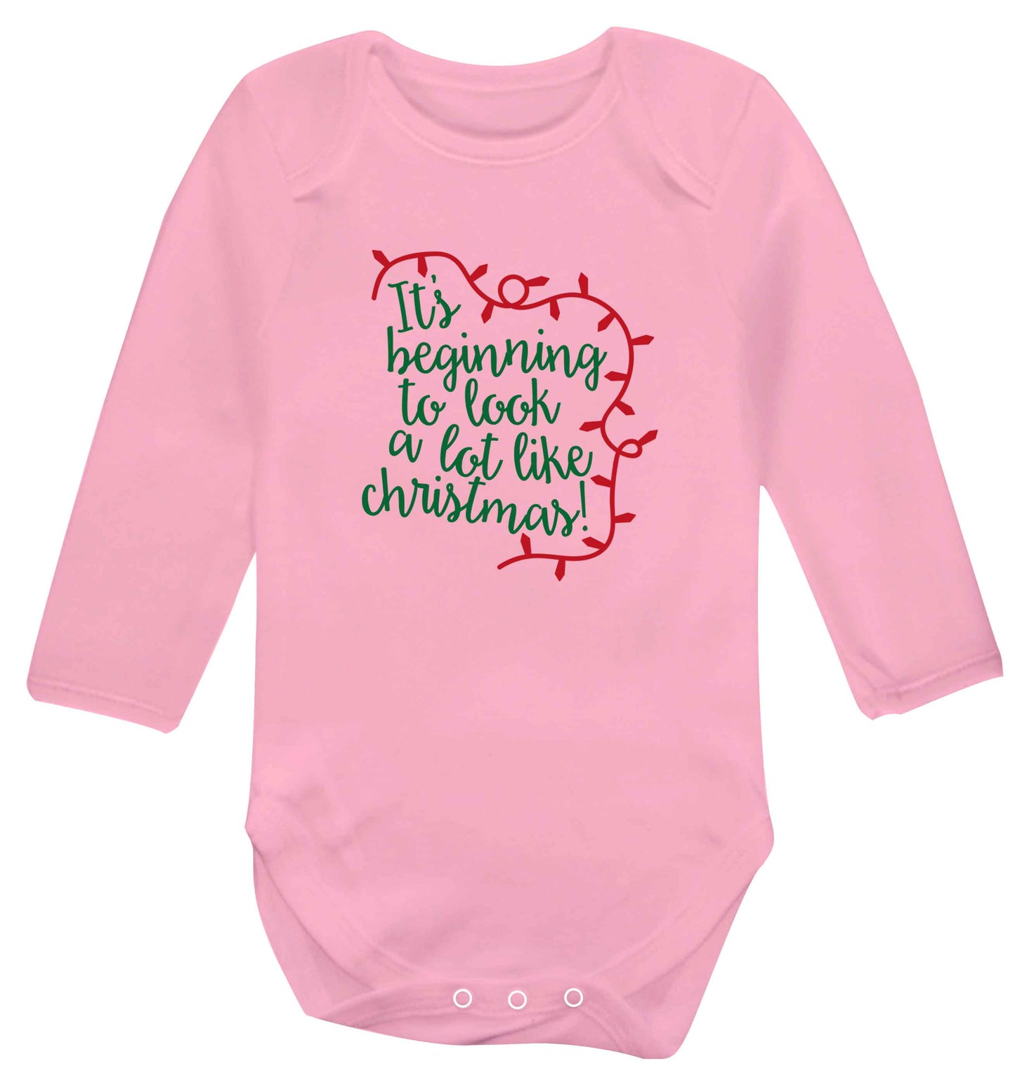 It's beginning to look a lot like Christmas baby vest long sleeved pale pink 6-12 months