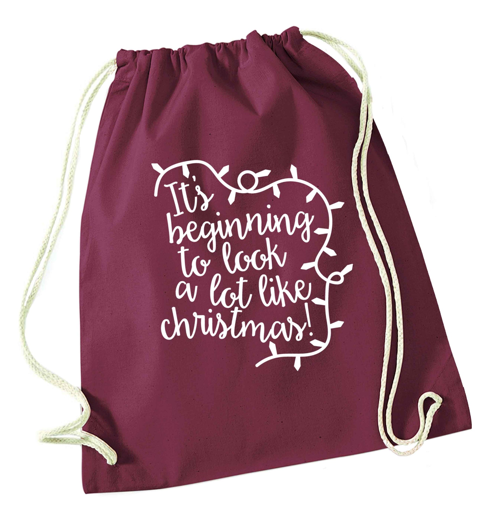 It's beginning to look a lot like Christmas maroon drawstring bag