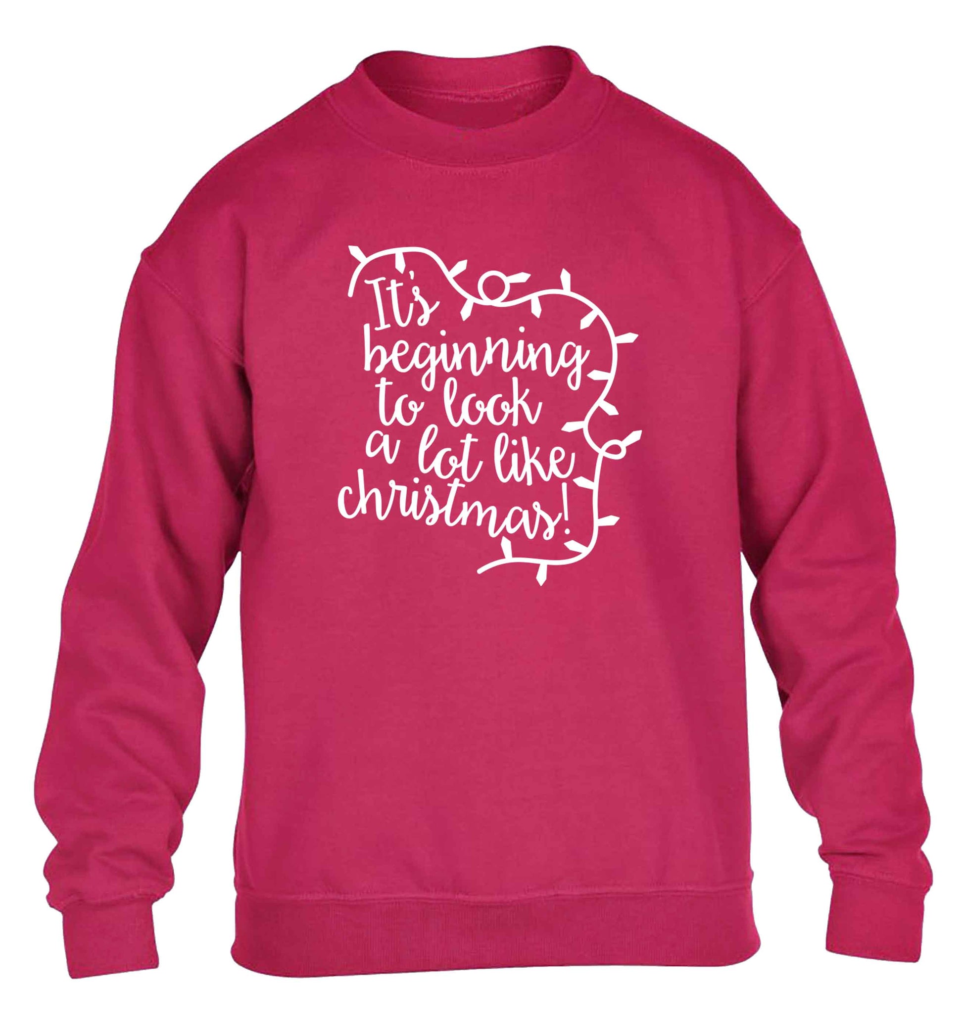 It's beginning to look a lot like Christmas children's pink sweater 12-13 Years