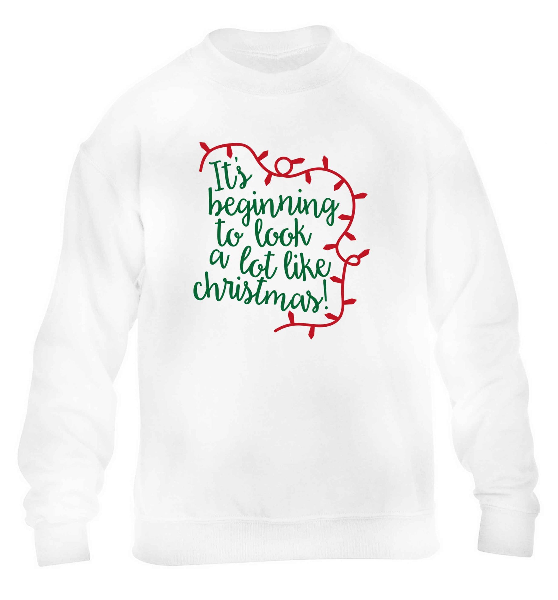 It's beginning to look a lot like Christmas children's white sweater 12-13 Years