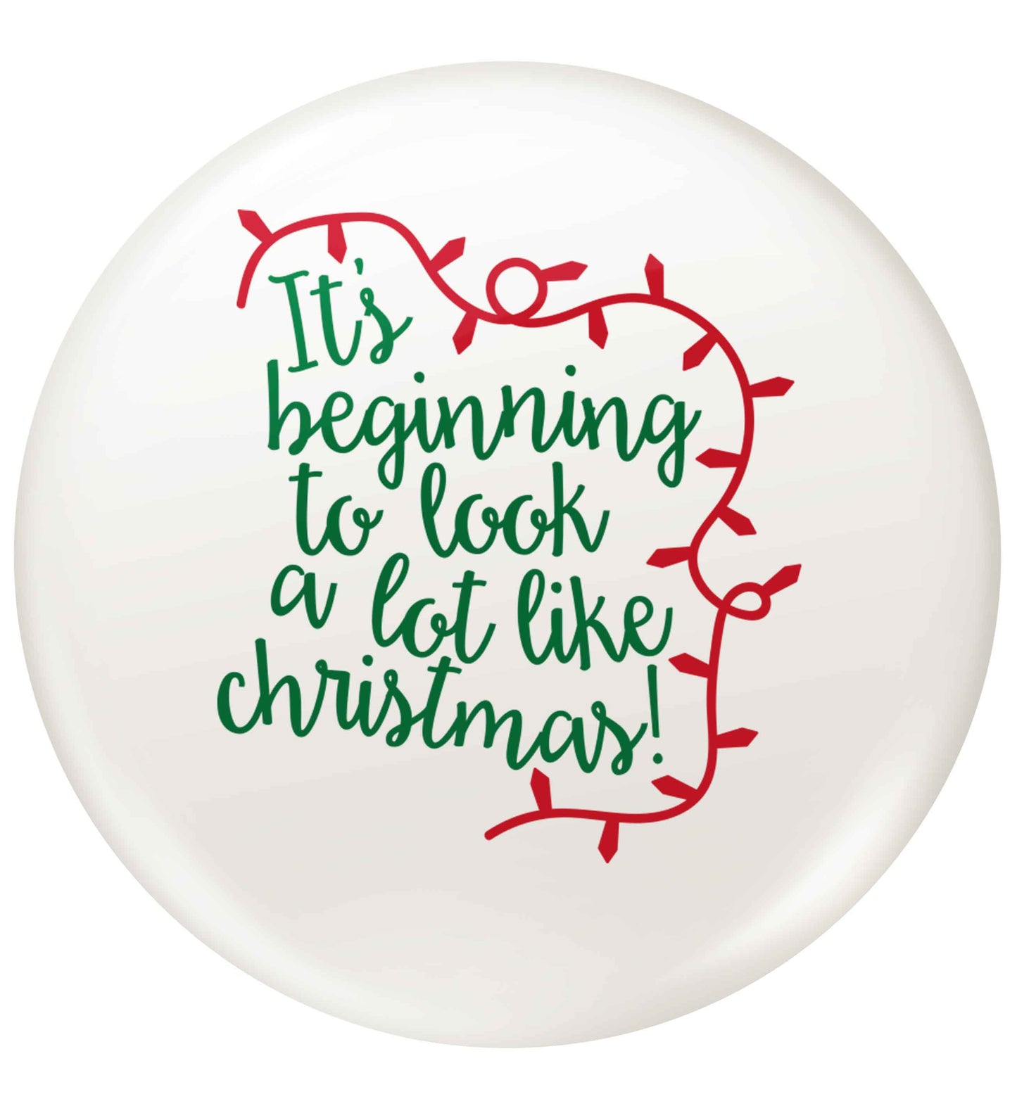 It's beginning to look a lot like Christmas small 25mm Pin badge