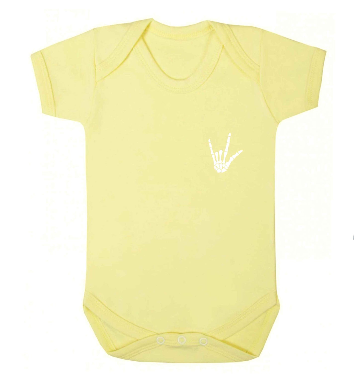Skeleton Hand Pocket baby vest pale yellow 18-24 months