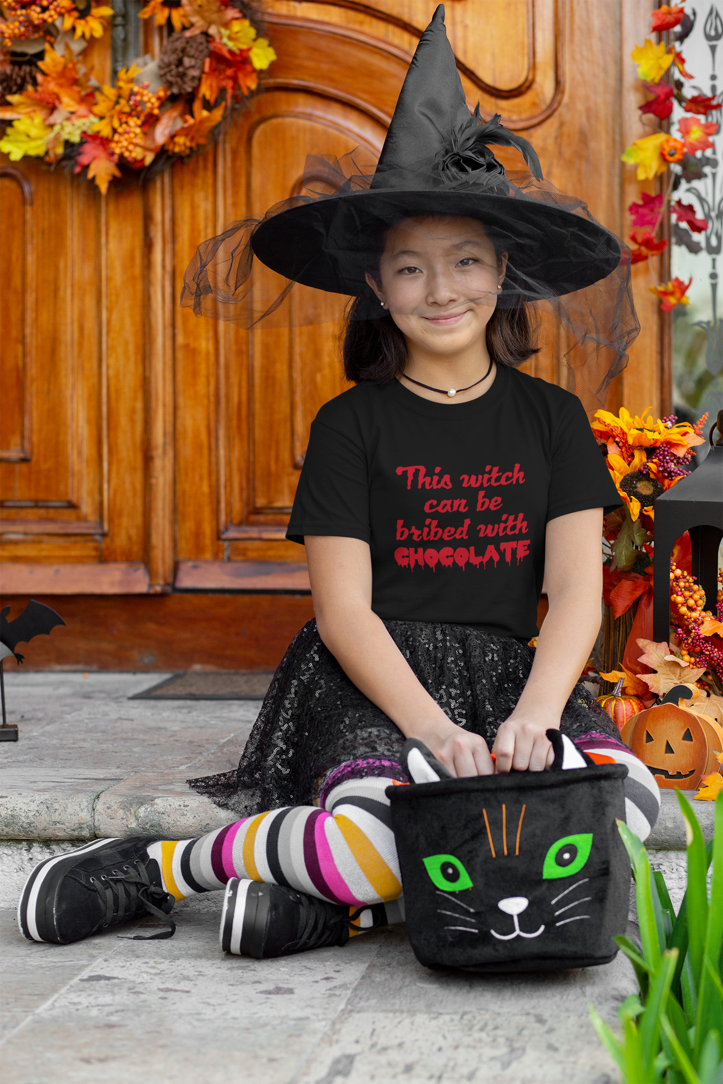 This witch can be bribed with chocolate | Children's Tshirt